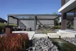 Brustor B200 terrace covering with automated louvered roof