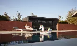 Brustor B200 XL patio roof with slats at the pool 